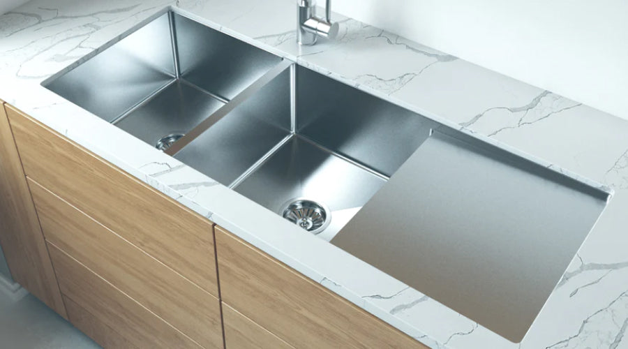 http://www.buildmat.com.au/cdn/shop/articles/do-i-need-a-draining-board-with-my-kitchen-sink.jpg?v=1659683148