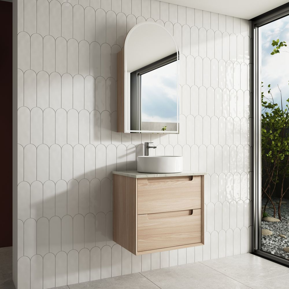 The Ainsley wall-hung vanity exudes modern elegance, boasting a sleek design that maximizes space. Its floating structure lends a contemporary feel, complemented by quality craftsmanship and versatile storage options. With clean lines and a minimalist aesthetic, it's an ideal choice for stylish, space-conscious bathroo