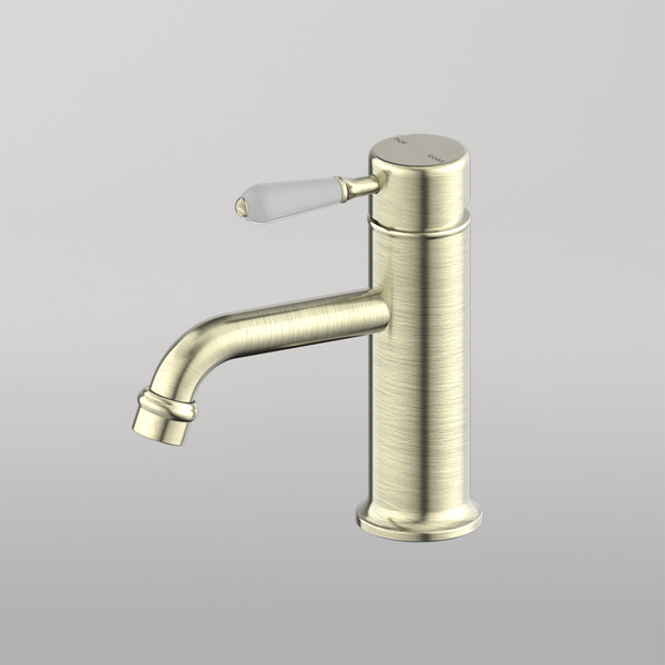 Nero York Straight Basin Mixer With White Porcelain Lever Aged Brass